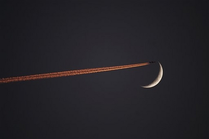 In this Dec. 1, 2008 file photo, a crescent moon is seen as ...